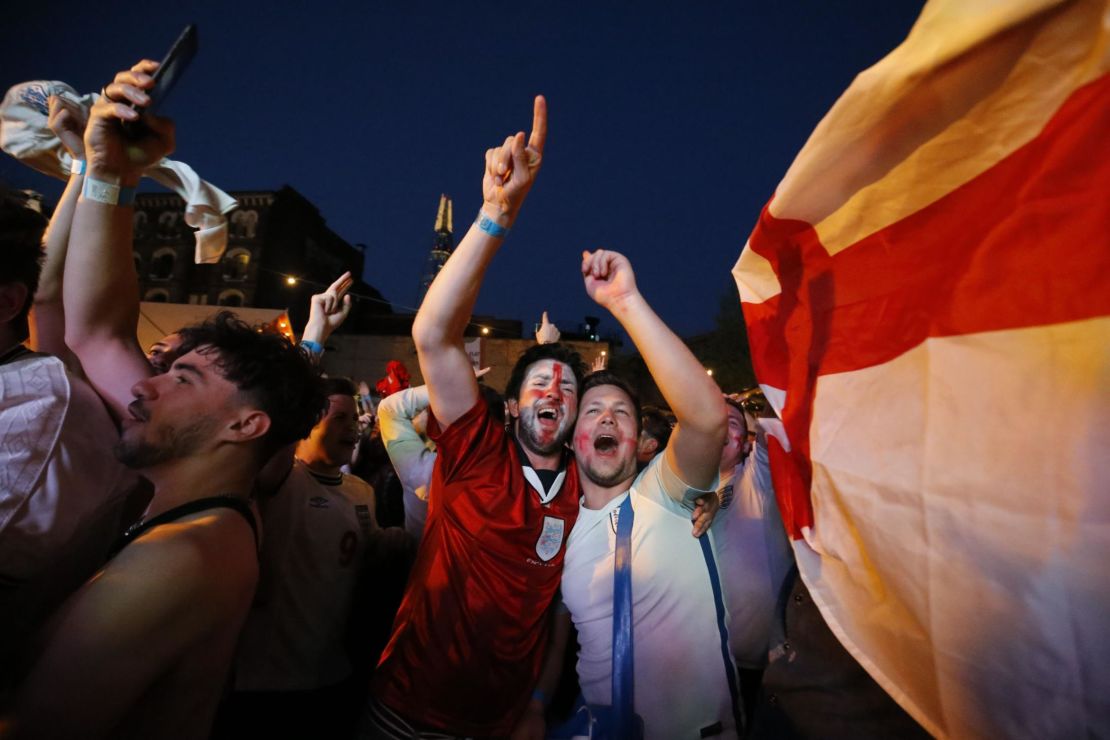 England fans party on the streets of London after witnessing the Three Lions win their first ever penalty shootout at a World Cup. 