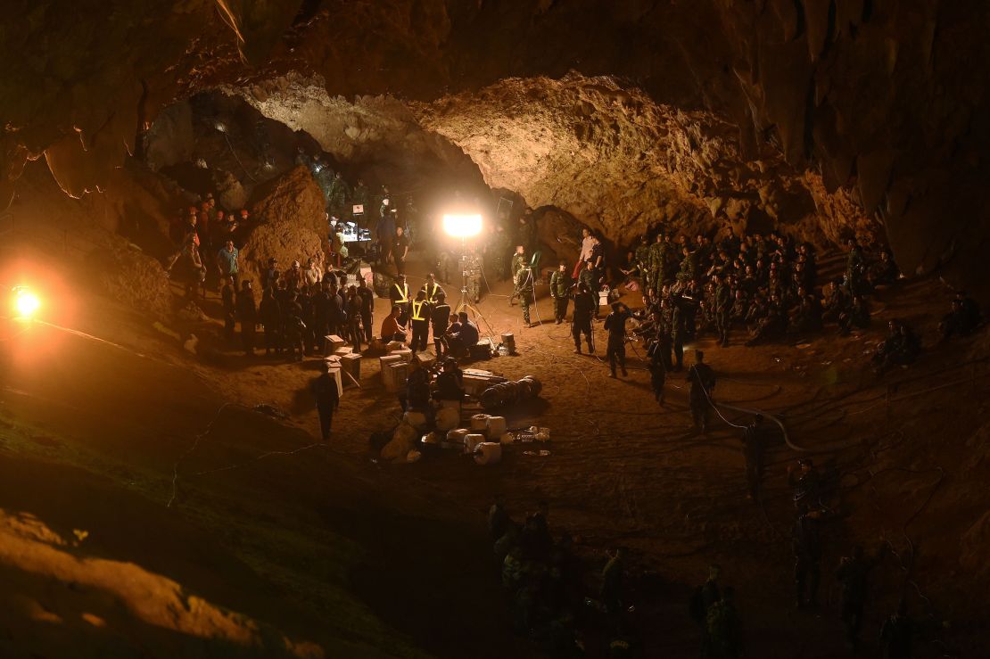 Thai soldiers relay electric cable deep into the Tham Luang cave at the Khun Nam Nang Non Forest Park in Chiang Rai.