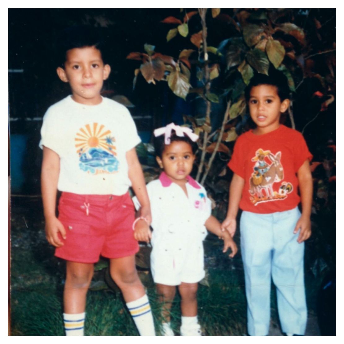 Juana Matias (center) with her two brothers