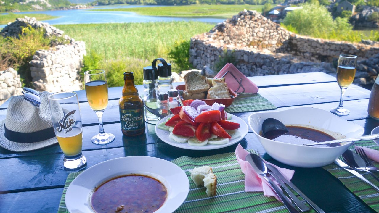Fresh fish, home-cured ham and local tomatoes are on the menu in various humble lakeside eateries.
