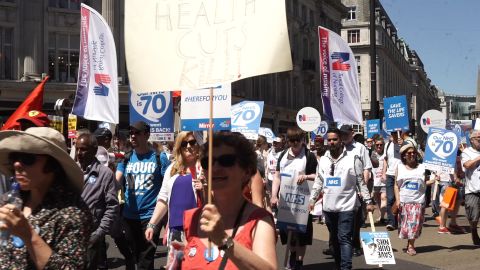 The NHS Anti-Swindle Team marched to mark NHS' 70th anniversary.