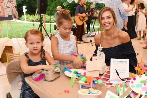 Alba with her daughters Haven and Honor at an Honest Company event in East Hampton, New York, in August 2017.
