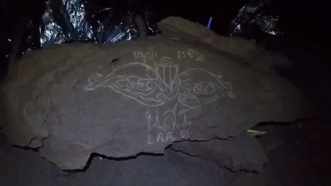 The insignia of the Thai Navy SEALs, etched onto a rock in the cavern the boys are trapped in.