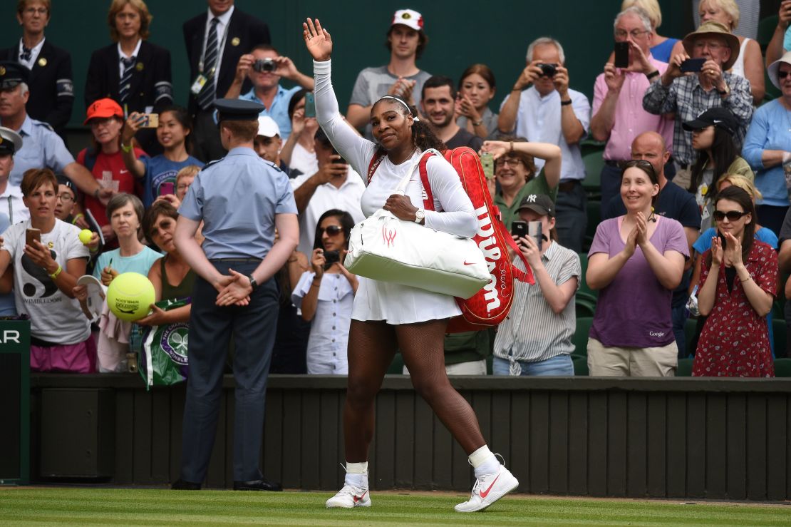 Serena Williams waves to the crowd as she leaves Centre Court after beating Viktoriya Tomova in straight sets. 