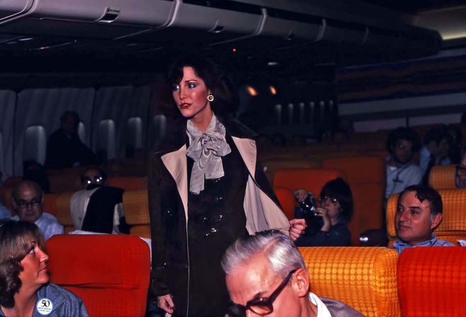 <strong>Show in the sky: </strong>Pan Am flight attendant, Siri Giberson, models an outfit during the Gucci fashion show as the flight headed towards the North Pole. 