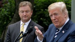 U.S. Sen. Dean Heller (R-NV) (L) listens to U.S. President Donald Trump delivers remarks during a signing ceremony for the Veterans Affairs Mission Act in the Rose Garden at the White House on June 6, 2018 in Washington, DC. The new law continues funding for the Veterans Choice Program for an additional year, extends comprehensive caregiver benefits to veterans injured and ill prior to September 11, 2001, and funds development of a plan to modernize the Department of Veterans Affair's health care infrastructure.  (Photo by Chip Somodevilla/Getty Images)