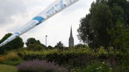 The spire of Salisbury Cathedral is seen behind police tape on July 5, 2018 cordoned off in connection with the investigation and major incident declared after a man and woman were found unconscious after  exposure with what was later identified as the nerve agent Novichok. 