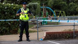 A police officer stands by a cordon in place at Queen Elizabeth Gardens in Salisbury after a major incident was declared when a man and woman were exposed to the Novichok nerve agent on July 5, 2018 in Salisbury, England. The couple, named locally as Dawn Sturgess 44, and Charlie Rowley, 45 were taken to Salisbury District Hospital on Saturday and remain there in a critical condition. In March Russian former spy Sergei Skripal and his 33-year-old daughter Yulia were poisoned with the Russian-made Novichok in the town of Salisbury. British Prime Minister Theresa May has accused Russia of being behind the attack on the former spy and his daughter, expelling 23 Russian diplomats in retaliation. (Photo by Jack Taylor/Getty Images)