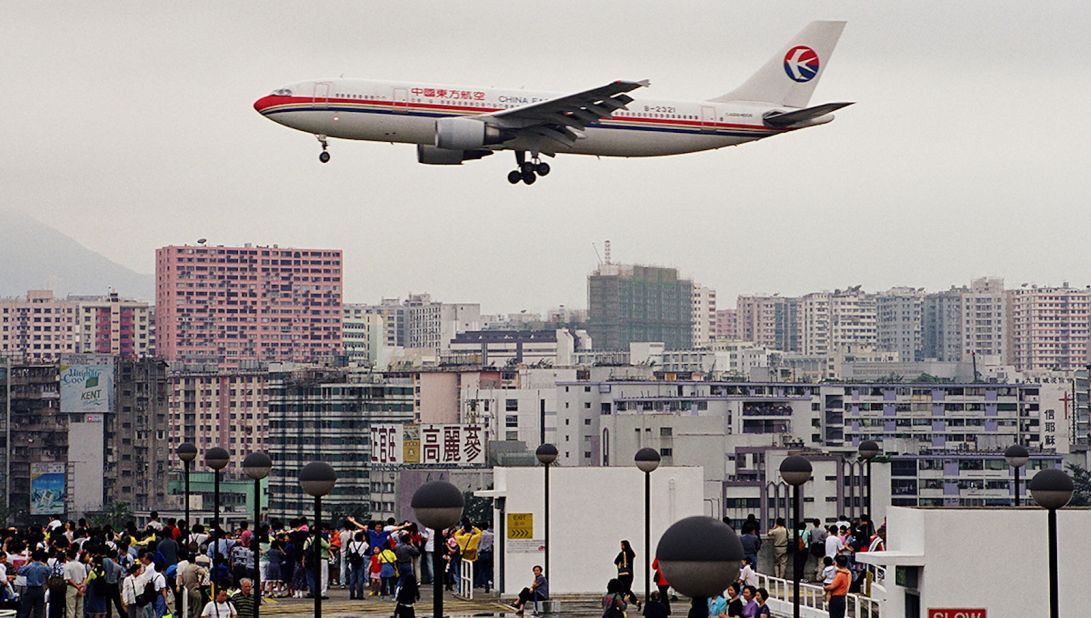 <strong>Best view in the sky: </strong>Plane spotters gathered on the roof of the car park at Kai Tak, recalls photographer Daryl Chapman. It was one of the best locations to see arriving and departing aircraft. 