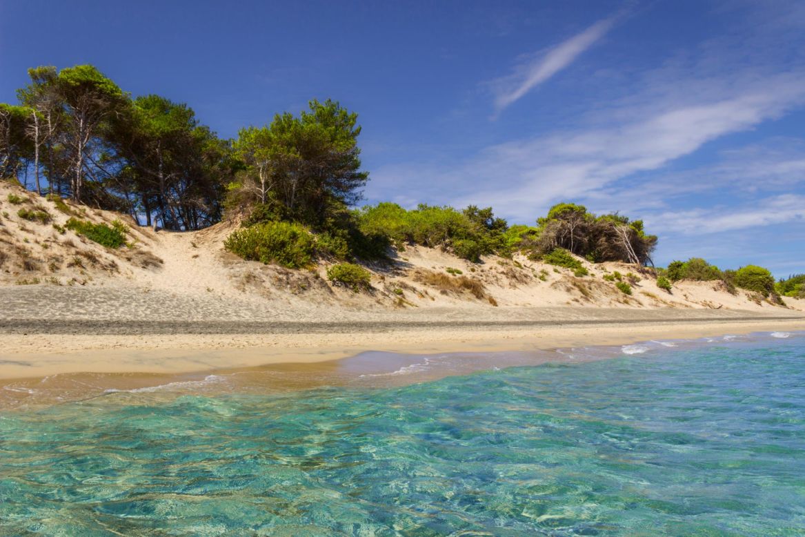 <strong>Alimini Lakes:</strong> A long beach of fine white sand and clear turquoise waters can be found where the saltwater Alimini Grande pours into the sea.