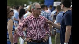 Environmental Protection Agency Administrator Scott Pruitt stands on the South Lawn during an afternoon picnic for military families at the White House, Wednesday, July 4, 2018, in Washington. (AP Photo/Alex Brandon)