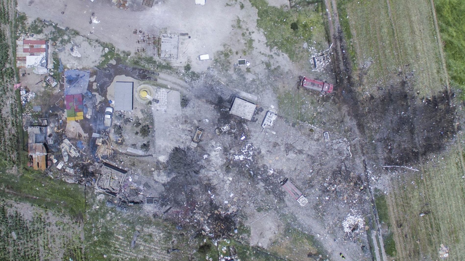 Aerial view shows devastation at warehouses in Tultepec.