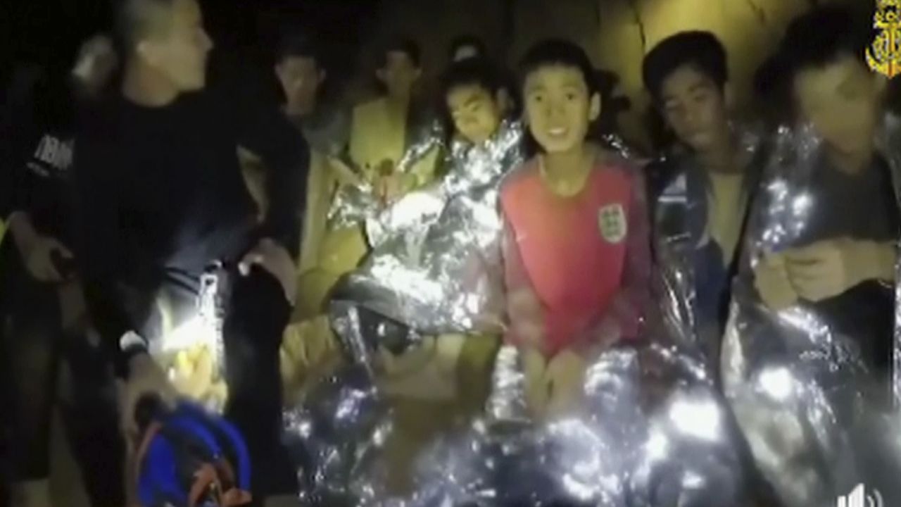 The Thai boys with Navy SEALs inside the cave on Tuesday.