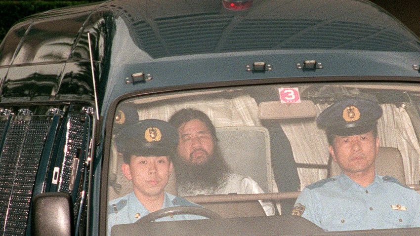 In this picture taken on July 19, 1995, Shoko Asahara (C), head of the doomsday cult Aum Shinrikyo, is transferred from Tokyo police headquarters to Tokyo District Court for questioning.
Seven of 13 members of a cult behind a deadly sarin attack in Tokyo's subway have been moved to different prison facilites, the justice ministry said on March 15, 2018, as speculation grows that they could soon be executed. The official declined to discuss exactly which of the members were moved out of Tokyo, but local media said the cult's guru Shoko Asahara remained in the Japanese capital. / AFP PHOTO / JIJI PRESS / JIJI PRESS / Japan OUT        (Photo credit should read JIJI PRESS/AFP/Getty Images)