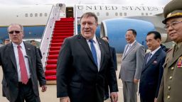 Secretary of State Mike Pompeo, center, arrives at Sunan International Airport in Pyongyang, North Korea, Friday, July 6, 2018. Pompeo is on a trip traveling to North Korea, Japan, Vietnam, Abu Dhabi, and Brussels. (AP Photo/Andrew Harnik, Pool)
