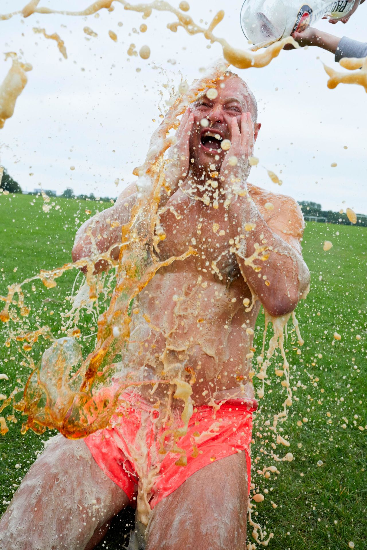Teller, being doused with beer in London's Brewster Gardens, celebrates Bayern Munich's sixth consecutive Bundesliga title earlier this year.