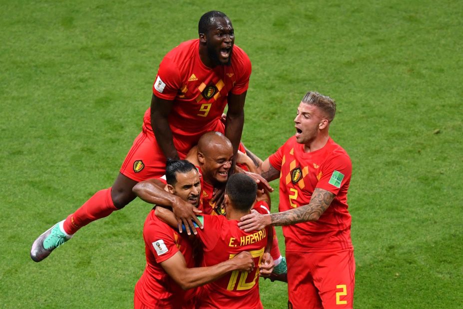 Belgium celebrates their first goal, which came off a deflected header in the 13th minute.