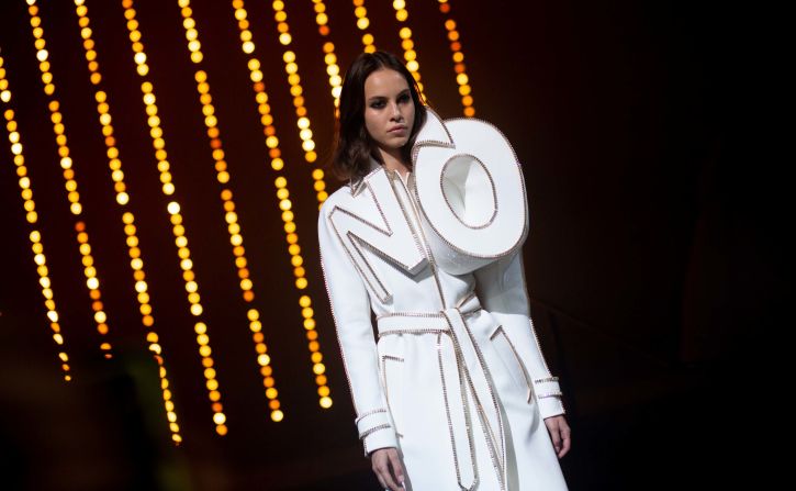 A model presents a creation during the Viktor & Rolf Haute Couture Autumn-Winter 2018 show at the Le Trianon theater in Paris on July 4, 2018.