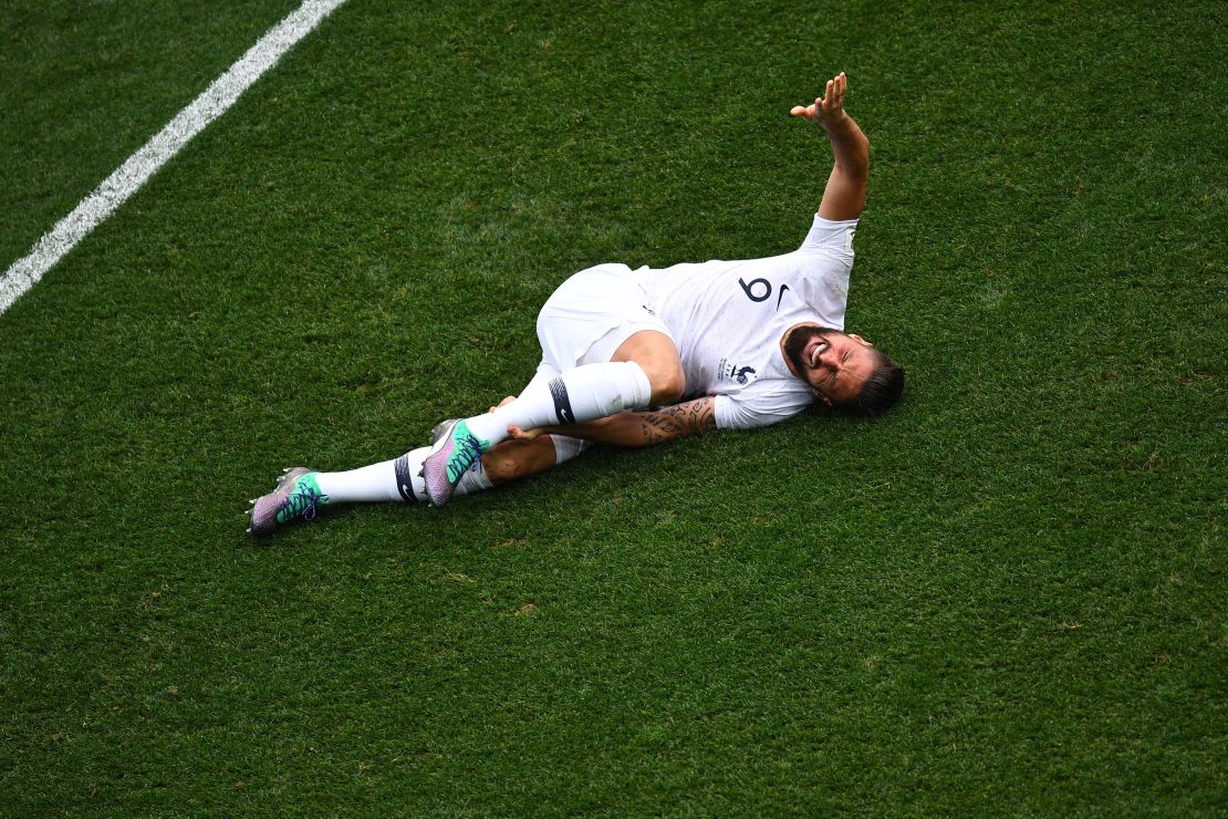 France forward Olivier Giroud reacts after a challenge during his team's match with Uruguay.