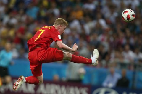 Kevin De Bruyne controls the ball against Brazil.