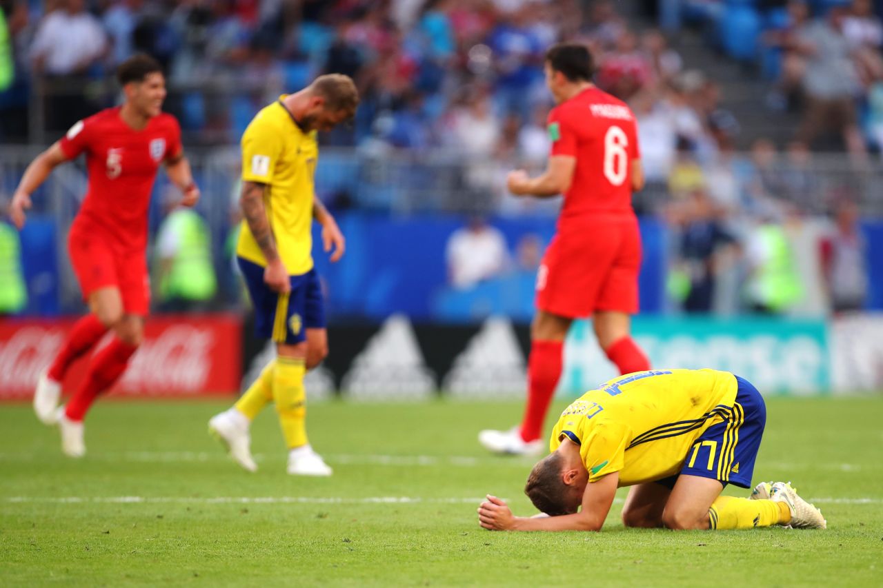 Swedish players are dejected at the end of the match.