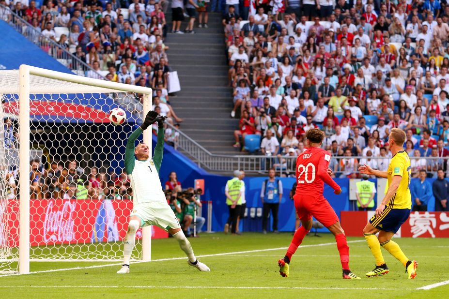 Dele Alli scores on a header for England's second goal.