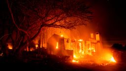 Flames consume a home on N. Fairview Ave. as the Holiday fire burns in Goleta, Calif., on Saturday, July 7, 2018. The blaze has destroyed multiple homes. (AP Photo/Noah Berger)