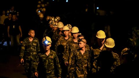 Hundreds of rescuers with equipment continue the rescue operation at the Tham Luang Nang Non cave on July 6.