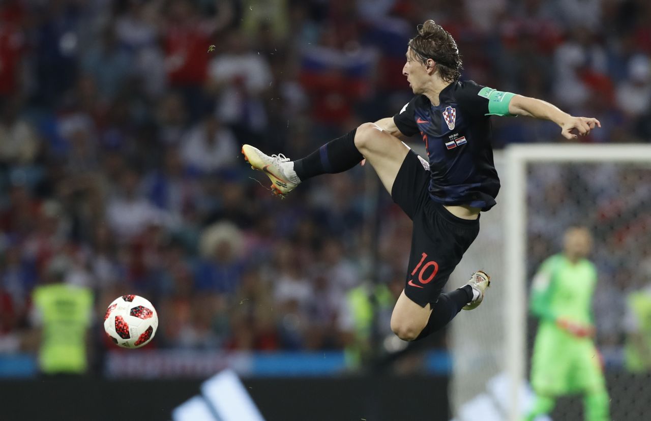 Luka Modric jumps for the ball during Croatia's quarterfinal victory over Russia on July 7.