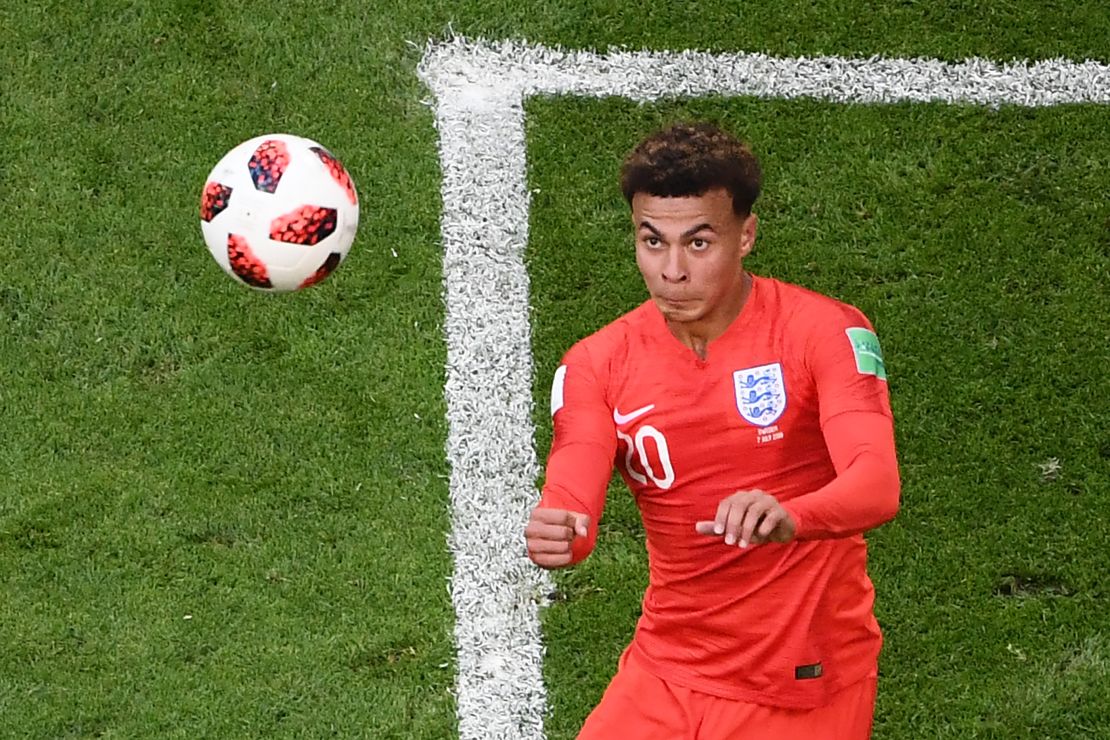 England midfielder Dele Alli heads the ball to score the second goal.