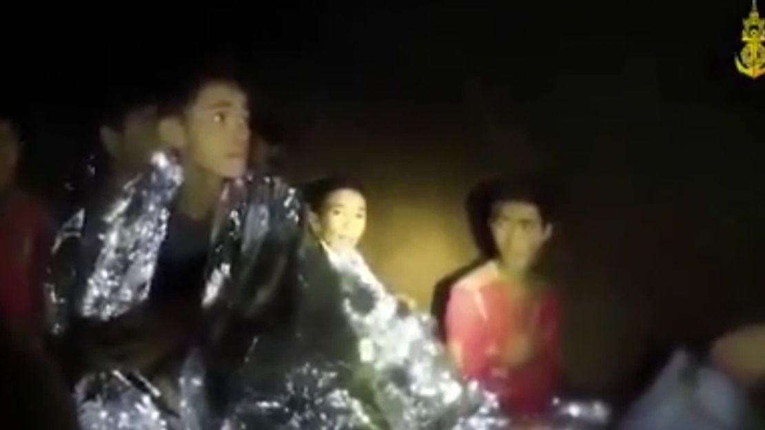 Known as Titun to his friends, Chanin Viboonrungruang is seen here in the center of an image filmed by the Thai Navy inside the cave. 