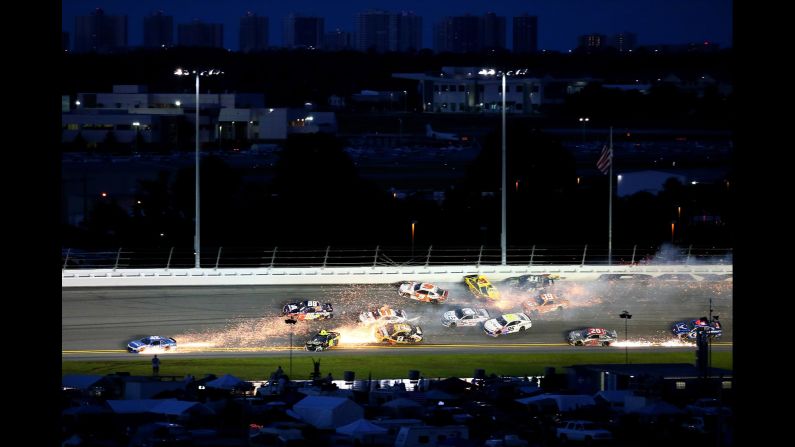 Chase Elliott and Denny Hamlin are involved in an on-track incident with several other cars at Daytona International Speedway on Saturday, July 7, in Daytona Beach, Florida.  