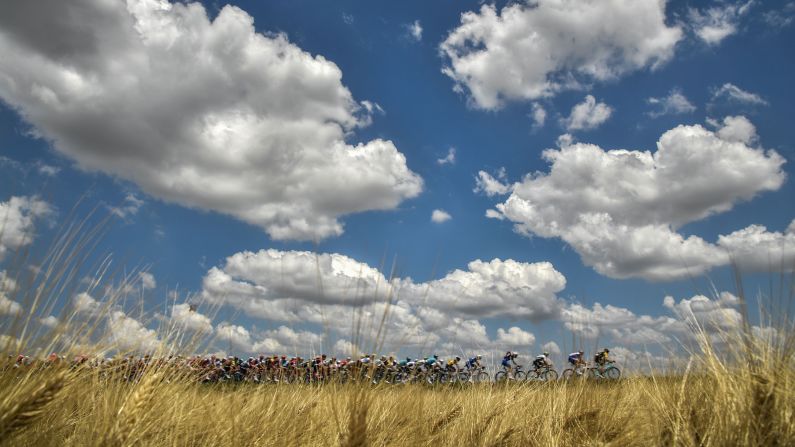 The pack rides through the countryside during the first stage of the 105th edition of the Tour de France cycling race in western France on Saturday, July 7. 