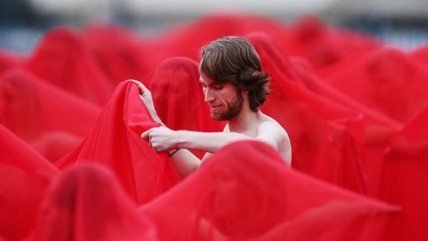 Participants pose as part of Spencer Tunick's "Return of the Nude" installation on July 9, 2018 in Melbourne, Australia.  