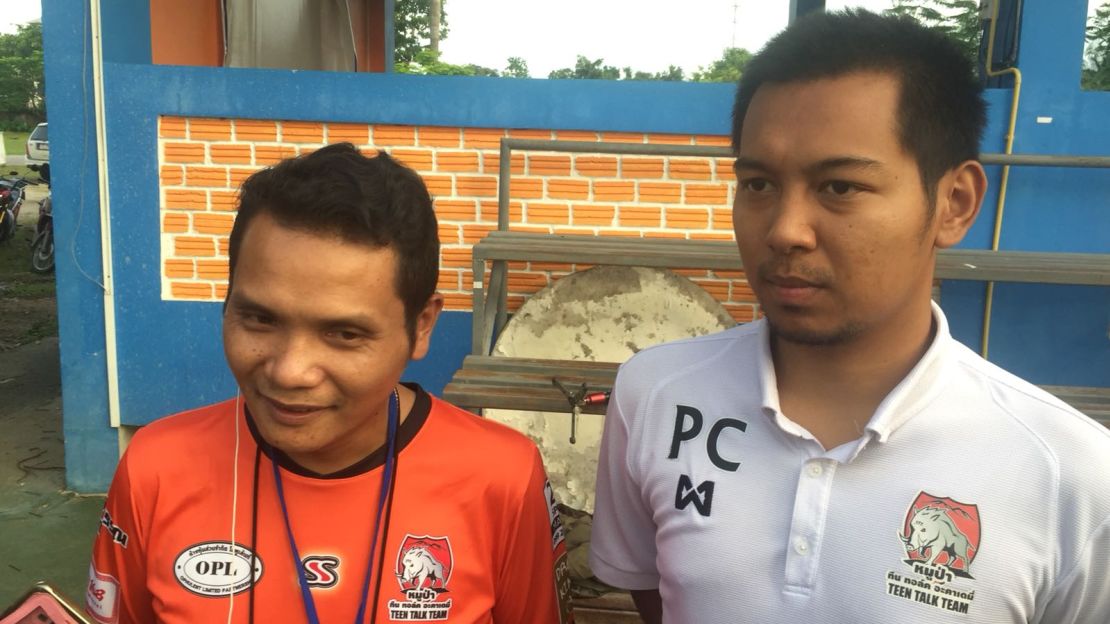 Nopparat Kanthawong, head coach of the Wild Boars, left, and Pannawit Jongkham, coach for the senior team, are feeling optimistic about the rescue.