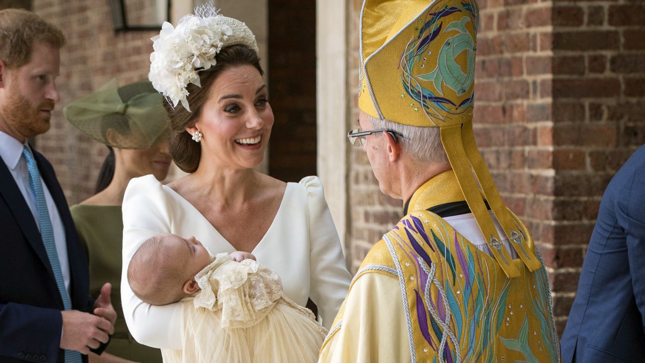 The Duchess of Cambridge speaks to Archbishop of Canterbury Justin Welby as she arrives carrying Prince Louis for his christening service.