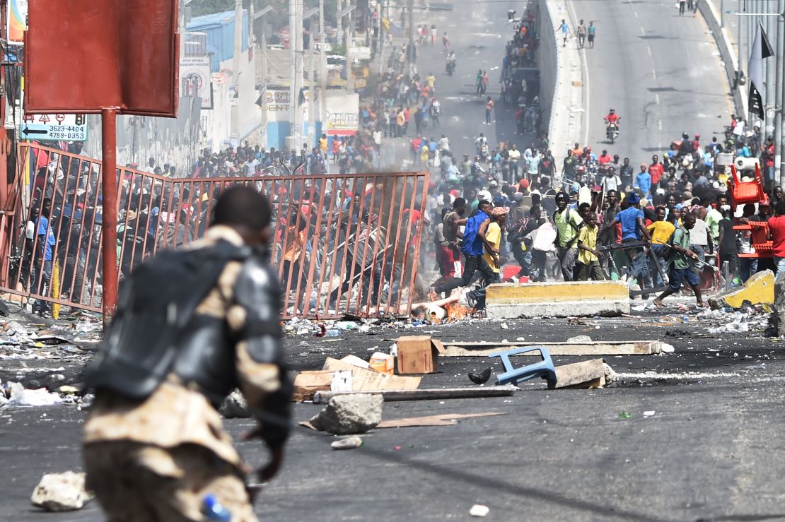 Looting broke out on the streets of Haiti's capital on July 8, after two days of deadly protests over ultimately suspended fuel price hikes. 