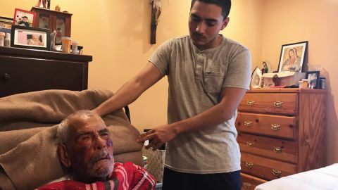 Rodolfo Rodriguez's grandson helps take care of him after he was assaulted on July 4.