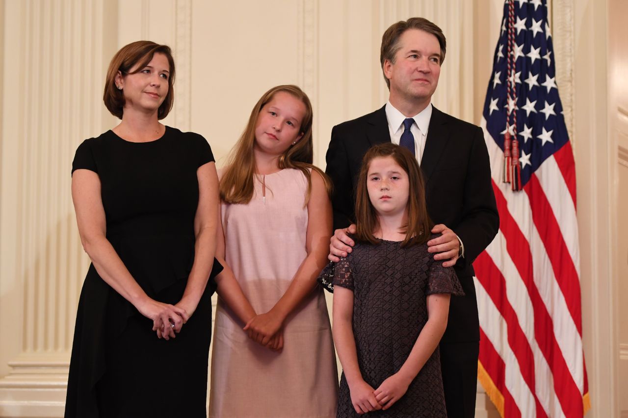 Kavanaugh stands by his wife, Ashley, and their daughters, Elizabeth and Margaret, as Trump introduces him at the White House.