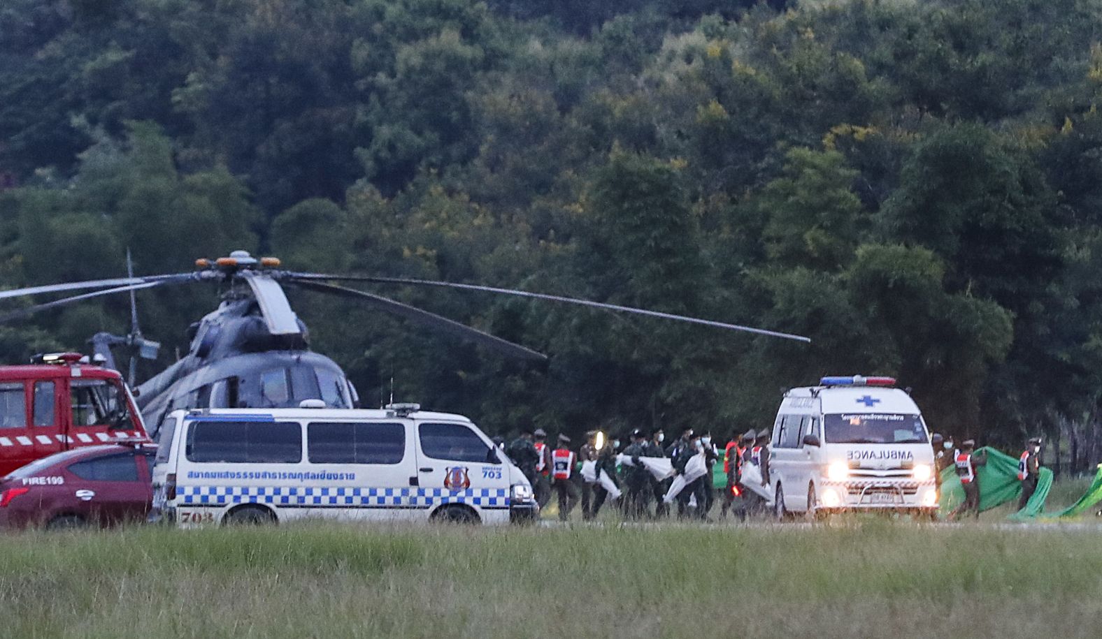 An ambulance believed to be carrying one of the rescued boys heads to the hospital on July 10.