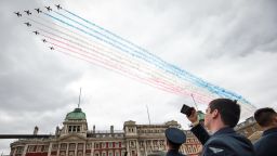Members of the Royal Air Force watch the Red Arrows flypast over Horse Guards Parade during RAF 100 celebrations on July 10, 2018 in London, England. A centenary parade and a flypast of up to 100 aircraft over Buckingham Palace takes place today to mark the Royal Air Forces' 100th birthday. Jack Taylor/Getty Images