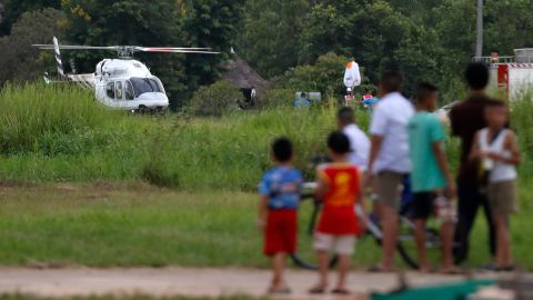 A helicopter believed to be carrying one of the boys rescued from the flooded caves.