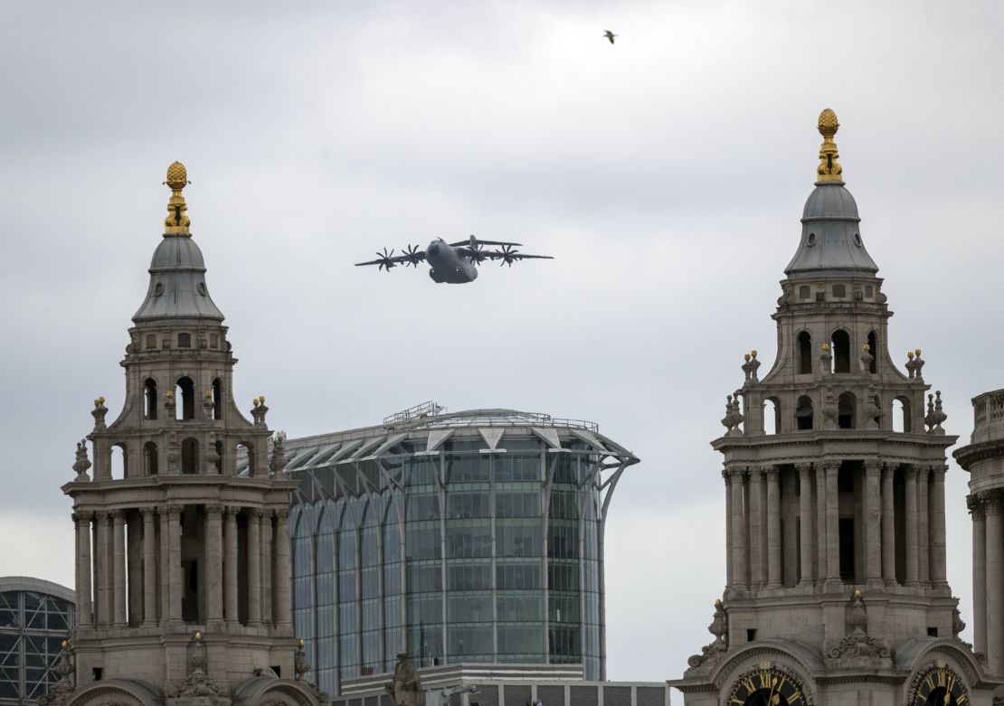 An RAF A400M Atlas takes part in a flypast over central London to mark 100 years of the RAF.