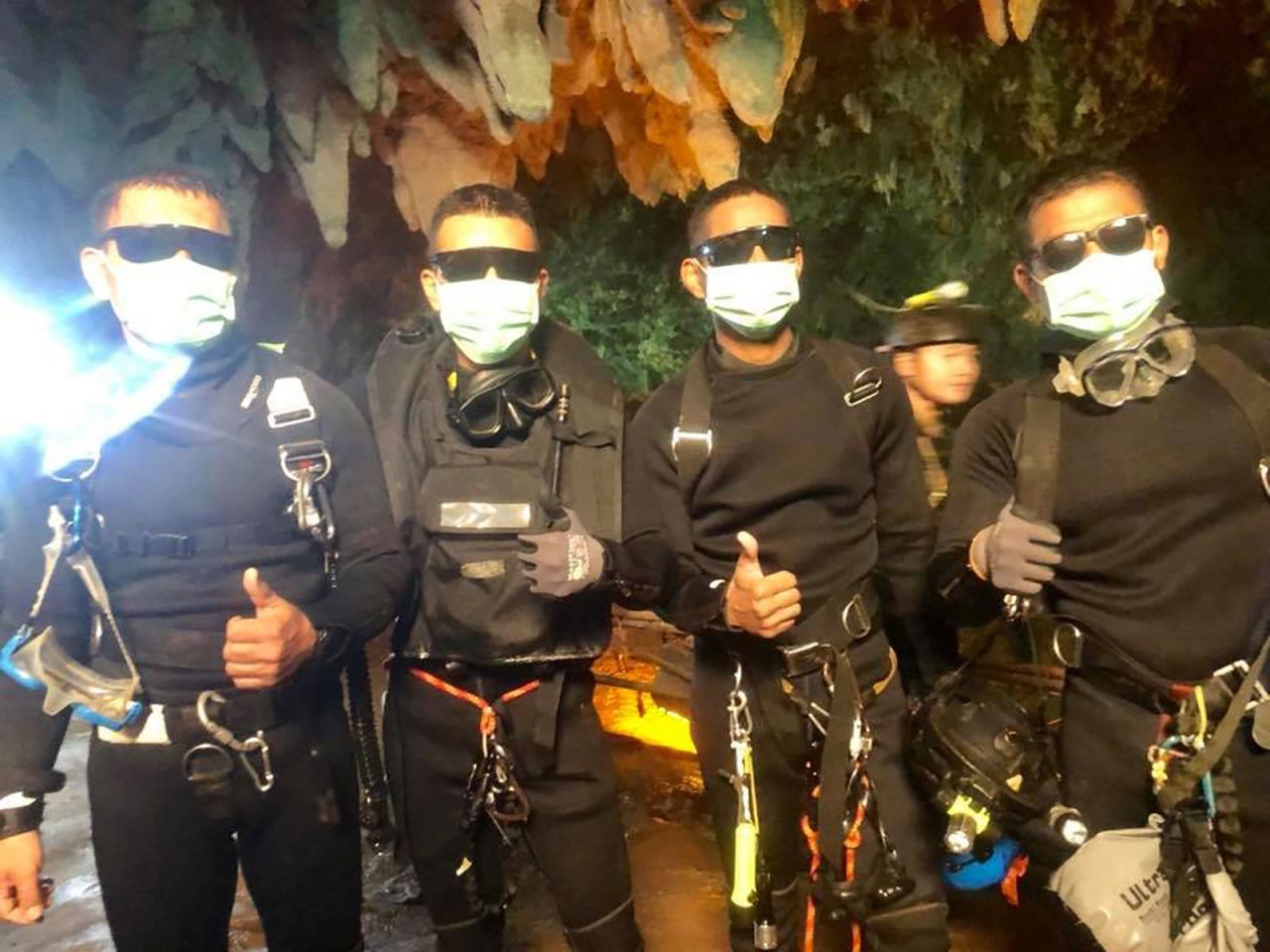 Thai Navy SEALs pose for a photo after the rescue effort was finished on July 10. One of them was a doctor who stayed with the team for a week after the group was found alive on July 2.