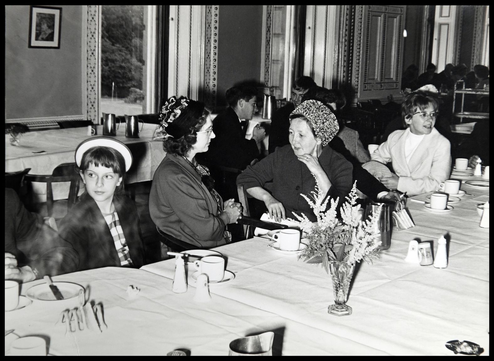 May, left, as a young girl.