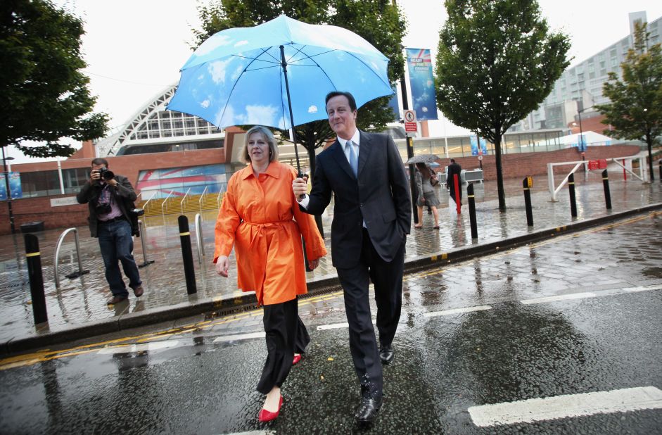 May joins then-Conservative Party leader <a href="https://www.cnn.com/2012/12/13/world/europe/david-cameron---fast-facts/index.html" target="_blank">David Cameron</a> during a party conference in Manchester, England, in October 2009. Cameron became Prime Minister the following year, and May was appointed home secretary.
