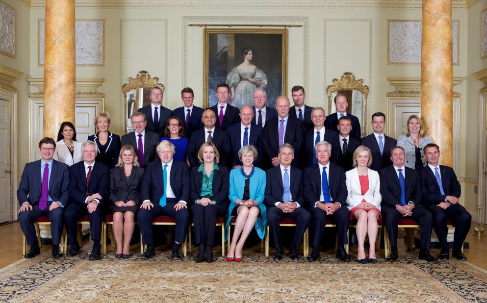 May, in the center of the front row, with members of her Cabinet in September 2016.