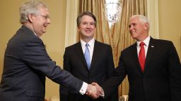 WASHINGTON, DC - JULY 10:  Judge Brett Kavanaugh (C) stands by as Senate Majority Leader Mitch McConnell (R-KY) (L) greets Vice President Mike Pence (R) before a meeting in McConnell's office in the U.S. Capitol July 10, 2018 in Washington, DC. U.S. President Donald Trump nominated Kavanaugh to succeed retiring Supreme Court Associate Justice Anthony Kennedy.  (Photo by Chip Somodevilla/Getty Images)