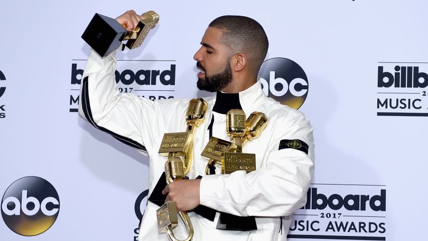 LAS VEGAS, NV - MAY 21:  Rapper Drake poses in the press room with his awards for Top Artist, Top Male Artist, Top Billboard 200 Artist, Top Billboard 200 Album for 'Views,' Top Hot 100 Artist, Top Song Sales Artist, Top Streaming Artist, Top Streaming Song (Audio) for 'One Dance,' Top R&B Song for 'One Dance,' Top R&B Collaboration for 'One Dance,' Top Rap Artist, Top Rap Album for 'Views,' and Top Rap Tour during the 2017 Billboard Music Awards at T-Mobile Arena on May 21, 2017 in Las Vegas, Nevada.  (Photo by David Becker/Getty Images)