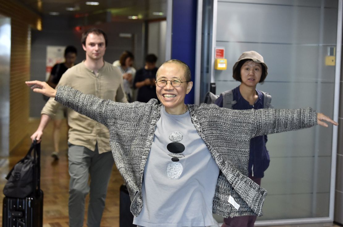 Liu Xia smiles as she arrives at the Helsinki International Airport in Vantaa, Finland, on July 10, 2018. Liu Xia's release had been seen by activists as a brief reprise from a continued crackdown on civil society. 